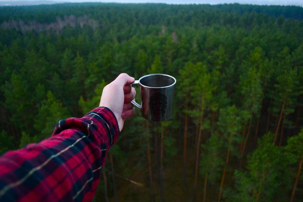 drinking coffee while wild camping (https://pixabay.com/photos/adventure-camping-forest-hiker-1840292/)